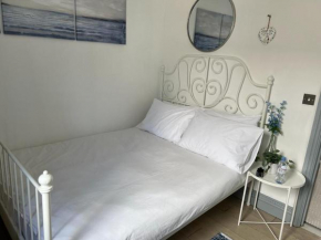 Stylish one bed apartment opposite station.